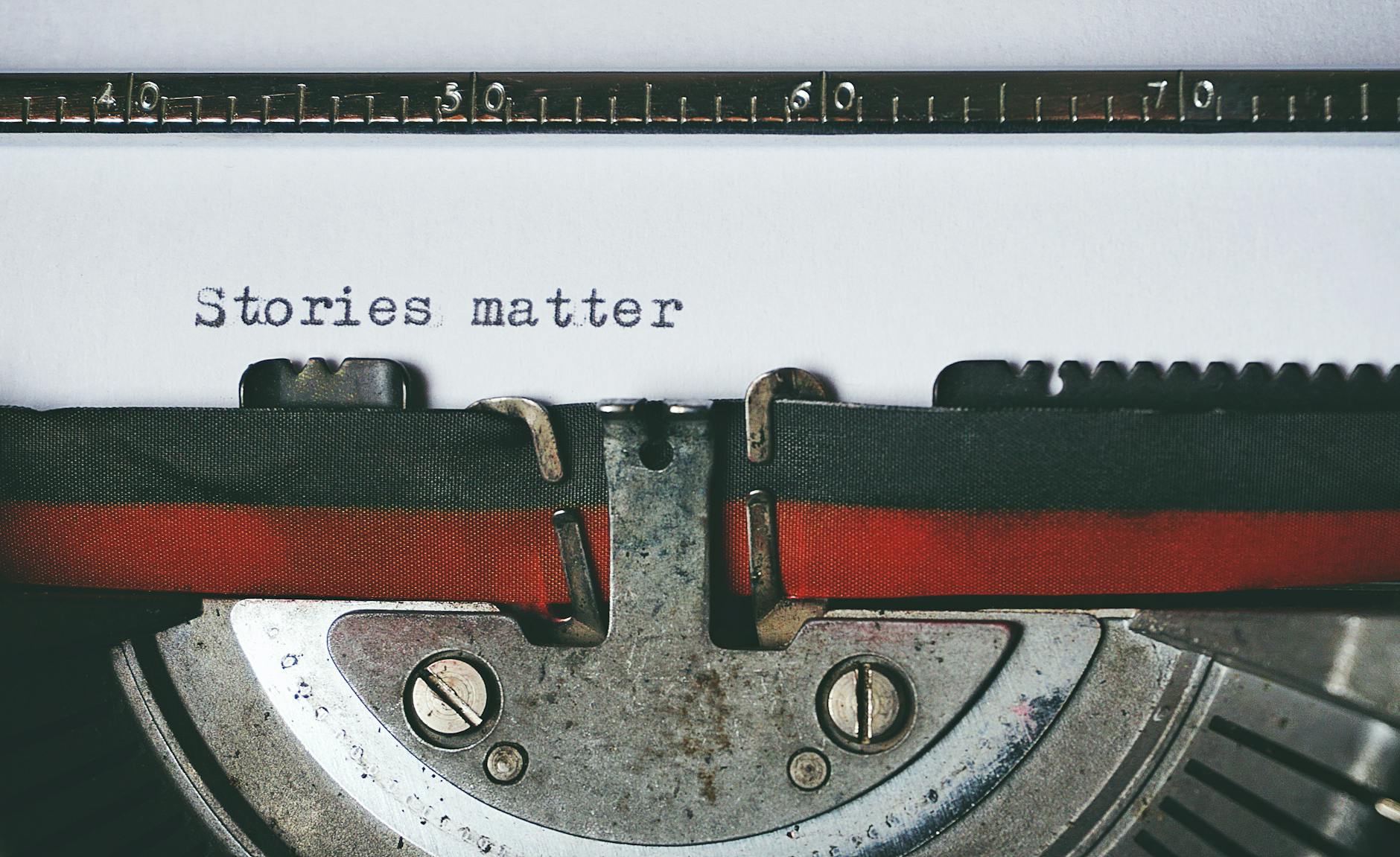 close up of a typewriter saying "stories matter"