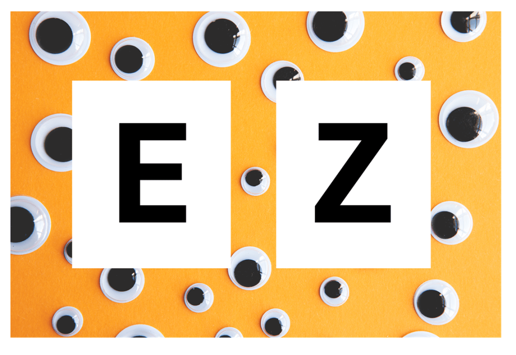 a picture of the letters E and Z laid on top of a page full of toy eyeballs