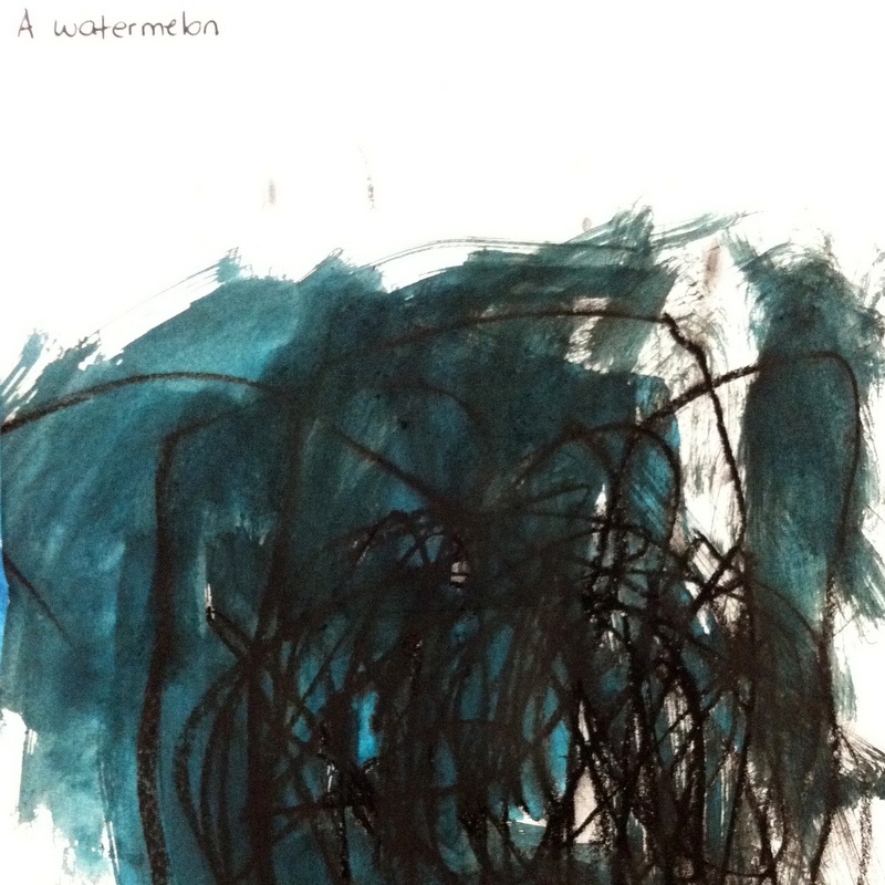 picture is of a black and green mess with a teacher's handwritten note: "a watermelon" beside it.