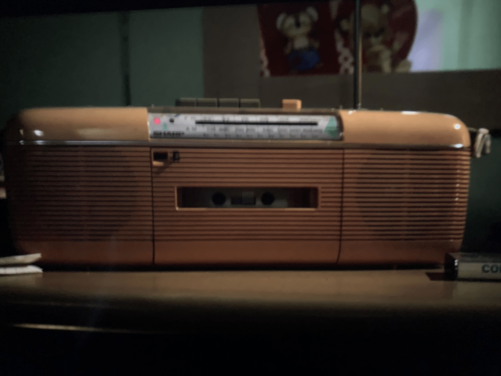 a photo of a pink cassette player